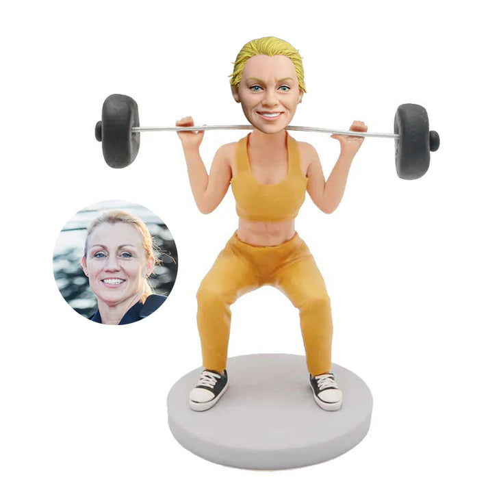 custom female weight lifter bobbleheads in yellow gym clothes