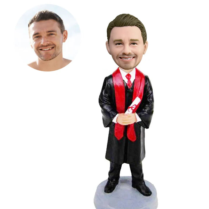 custom handsome male graduation bobbleheads in black gown with red ribbons