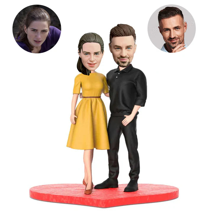 custom couple bobbleheads in retro dressed caker topper